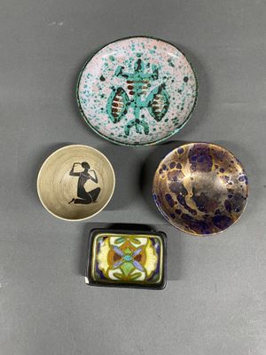 three bowls and a bowl with a picture of a woman on them