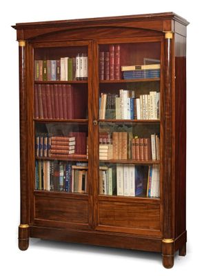 IMPORTANTE BIBLIOTHEQUE en acajou et placage d'acajou, à fro…