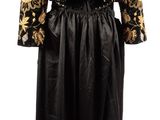 a black and gold dress with gold flowers on it