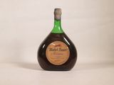 a bottle of liquor that is sitting on a table