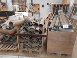 a large pile of pipes and pipes in a warehouse
