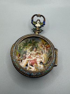 une photo d'un tableau accroché au mur représentant une montre de poche