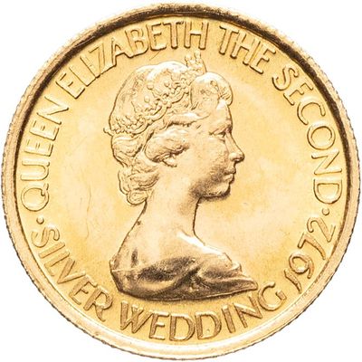 une image montrant un gros plan d'une pièce d'or sur laquelle figure le visage d'une femme