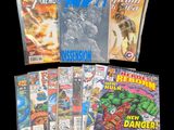 a group of comic books sitting on top of a table