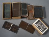 several boxes of different types of leather are sitting on a table