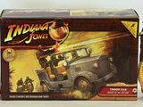 three action figures of a man in a car and a woman in a car