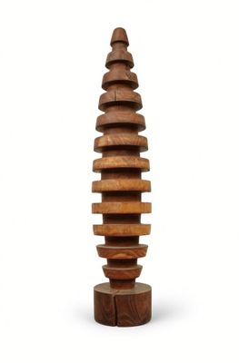 an image of a wooden sculpture of a tower made of stacked wooden blocks