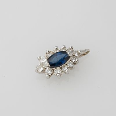 a sapphire and diamond cluster ring