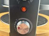 an image of a close up of a toaster on a wooden stand
