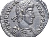 une pièce d'argent portant l'image d'un homme