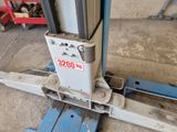 an image of a fork lifter with a sign on it