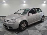 a picture of a silver car parked in a garage