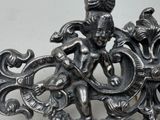 a statue of a man riding a horse with a bird on its back
