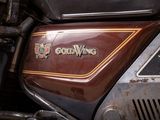 a close up of a motorcycle with a logo on it