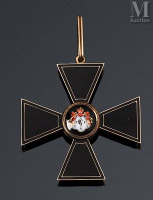 un gros plan d'une croix sur laquelle figure l'image d'un homme