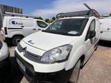a white van that is parked in a lot