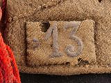 a brown bag with a number on it sitting on a black surface