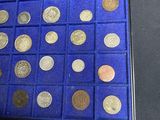 a display case with a lot of coins in it
