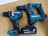 trois perceuses-visseuses sans fil Makita posées sur un parquet