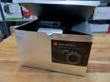 a box with a camera inside of it on a table