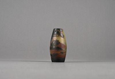 a small vase that is sitting on a table