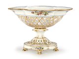 a white and gold bowl on a stand on a white background
