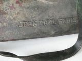 a purse with a name on it sitting on a table