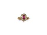an oval ruby and diamond ring