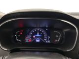 the dashboard of a car with a digital instrument on it