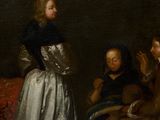 painting of a group of people sitting around a table in a dark room