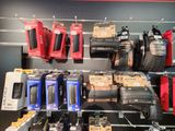 many different types of cell phones on display in a store