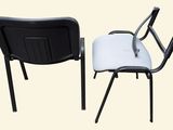two black and white chairs sitting next to each other