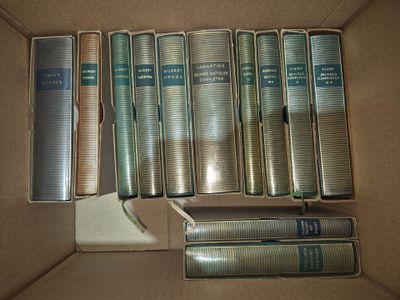 a lot of books in a box on the table