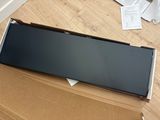 a box that has a laptop in it on the floor