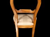 an image of a chair with a seat made of wood and a cushion