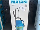 a box of matabi water jugs on a shelf in a store