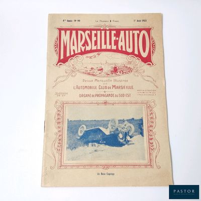 un vieux magazine français avec la photo d'une femme dans une voiture