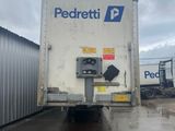 a semi truck that is parked in a parking lot