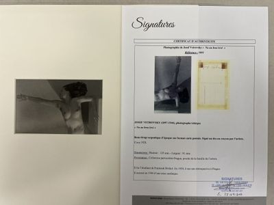 a book with a picture of a naked woman on it