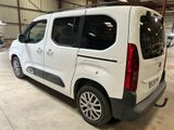 a white van that is parked in a garage