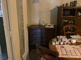 a dining room with a table and chairs in it