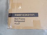 a box with a picture of a bed frame in it