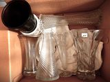 a box with a bunch of empty wine glasses in it