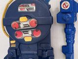 a blue toy robot next to a blue toy water pump