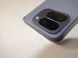 a close up of a cell phone on a table