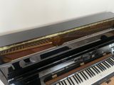 a piano that is sitting on top of a table