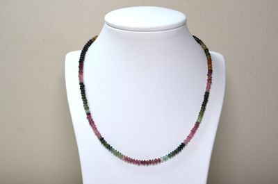 a picture of a necklace made of multi colored beads