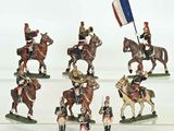 several figurines of soldiers riding horses and holding flags
