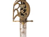 a gold and silver sword with a dragon on it