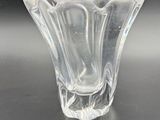 an image of a clear glass vase on a table with a price tag
